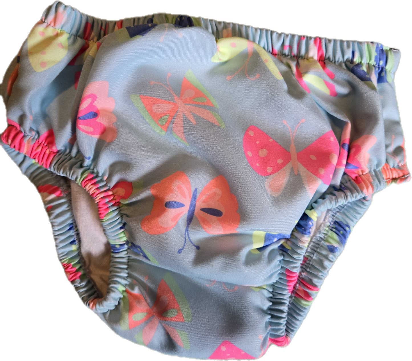 F - Couche de piscine papillon comme neuve 6/12 mois