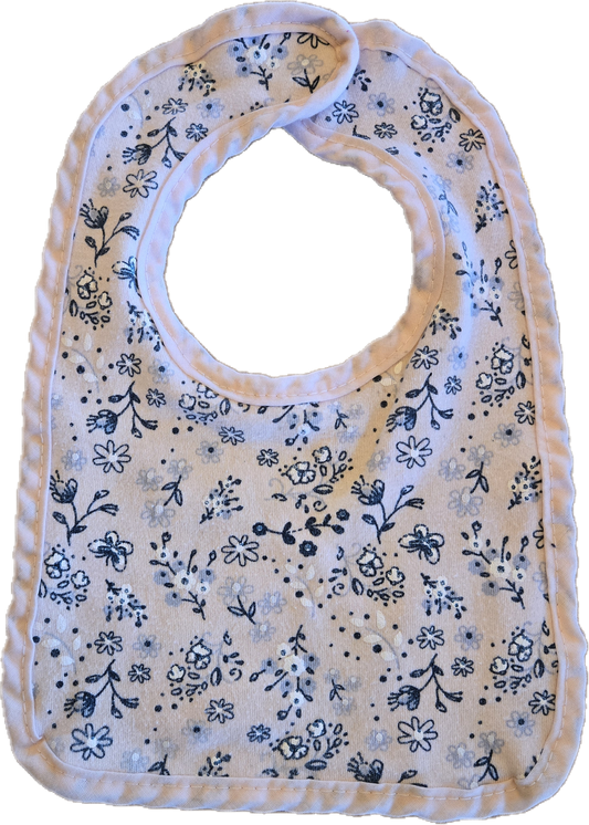 Bavoir fleuri rose pâle